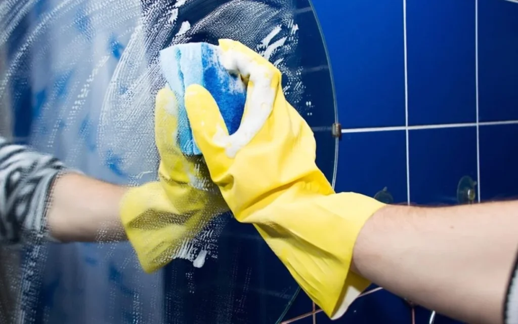 professional cleaner carefully cleaning surfaces in a home