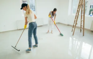 empty apartment receiving professional deep cleaning before final inspection