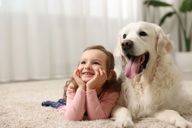 clean North Jersey family home with children and a dog in the living room